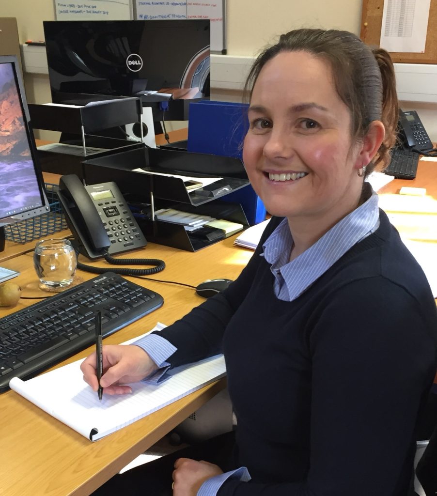 A member of the Stockdale team at her desk