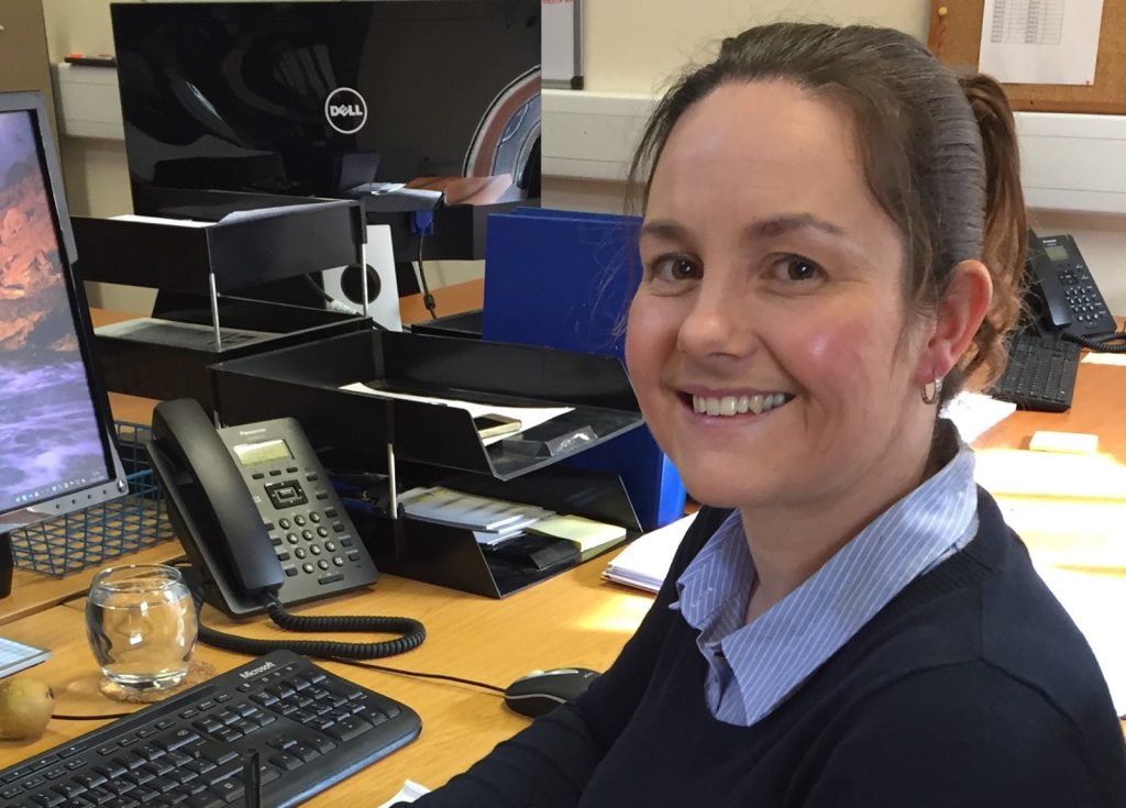A member of the Stockdale team at her desk